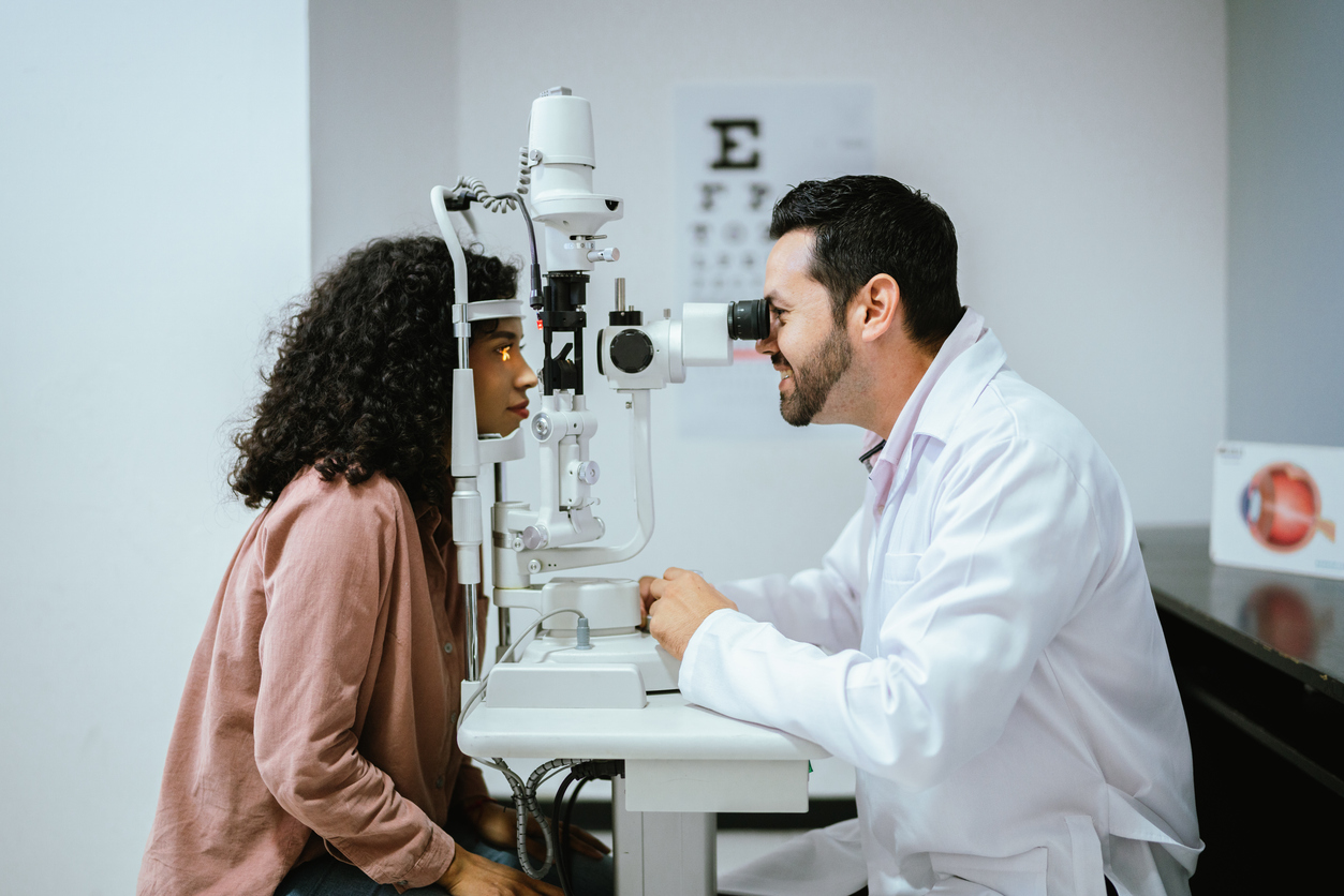Young woman doing optical exam at medical clinic